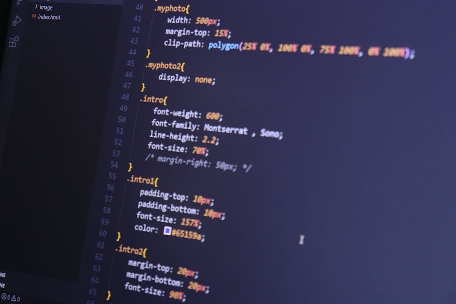 A close-up image of a computer screen displaying lines of CSS code in a code editor with a dark background. The code features various style declarations such as font-weight, font-family, line-height, 